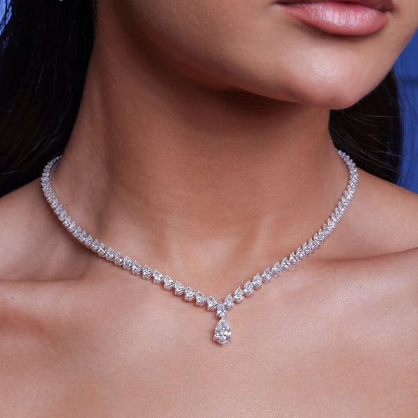 The Regal V-Shape: Pear-Cut Diamond Solitaire Drop Necklace