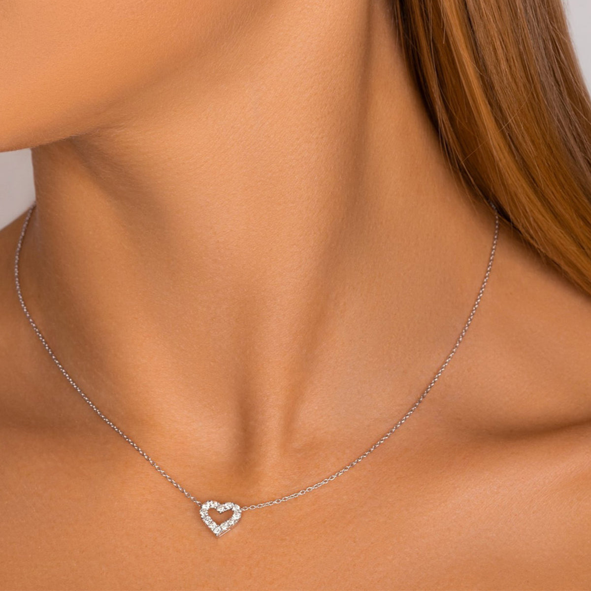 Petite Heart-Shaped Round Diamond Pendant
