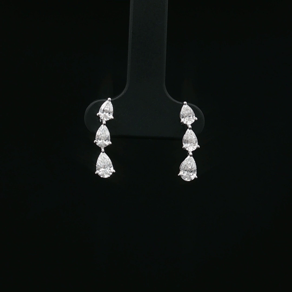 Arc Pear Diamond Stud Earrings