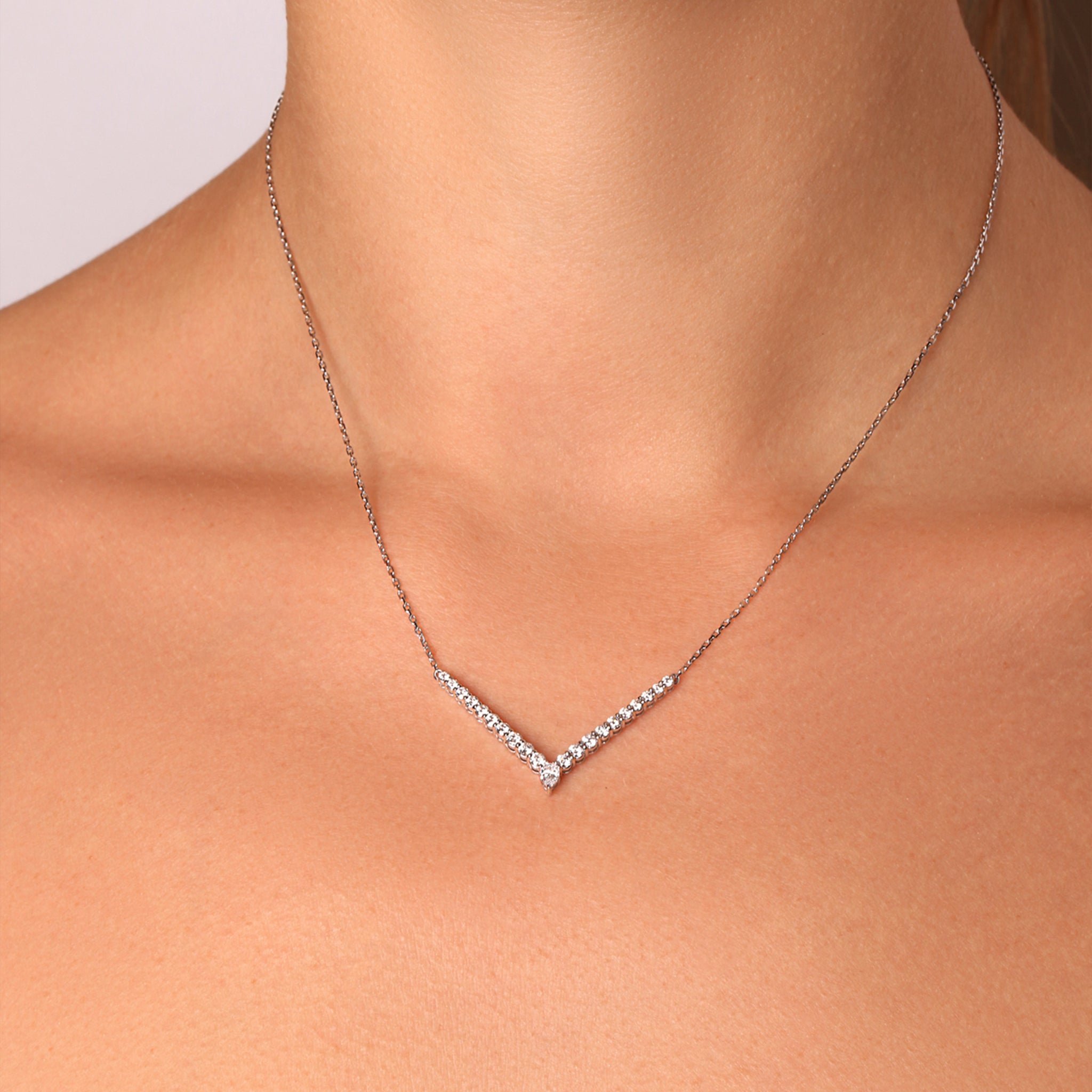 V-Shaped Pear and Round Diamond Pendant    
