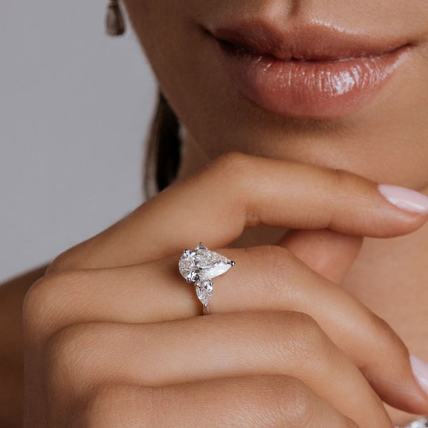 THREE STONE PEAR SOLITAIRE RING